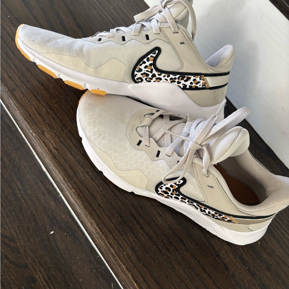 Nike Cream and Black Athletic Shoes with Leopard Detail